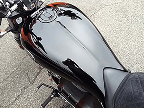 Black motorcycle tank after, mirror gloss